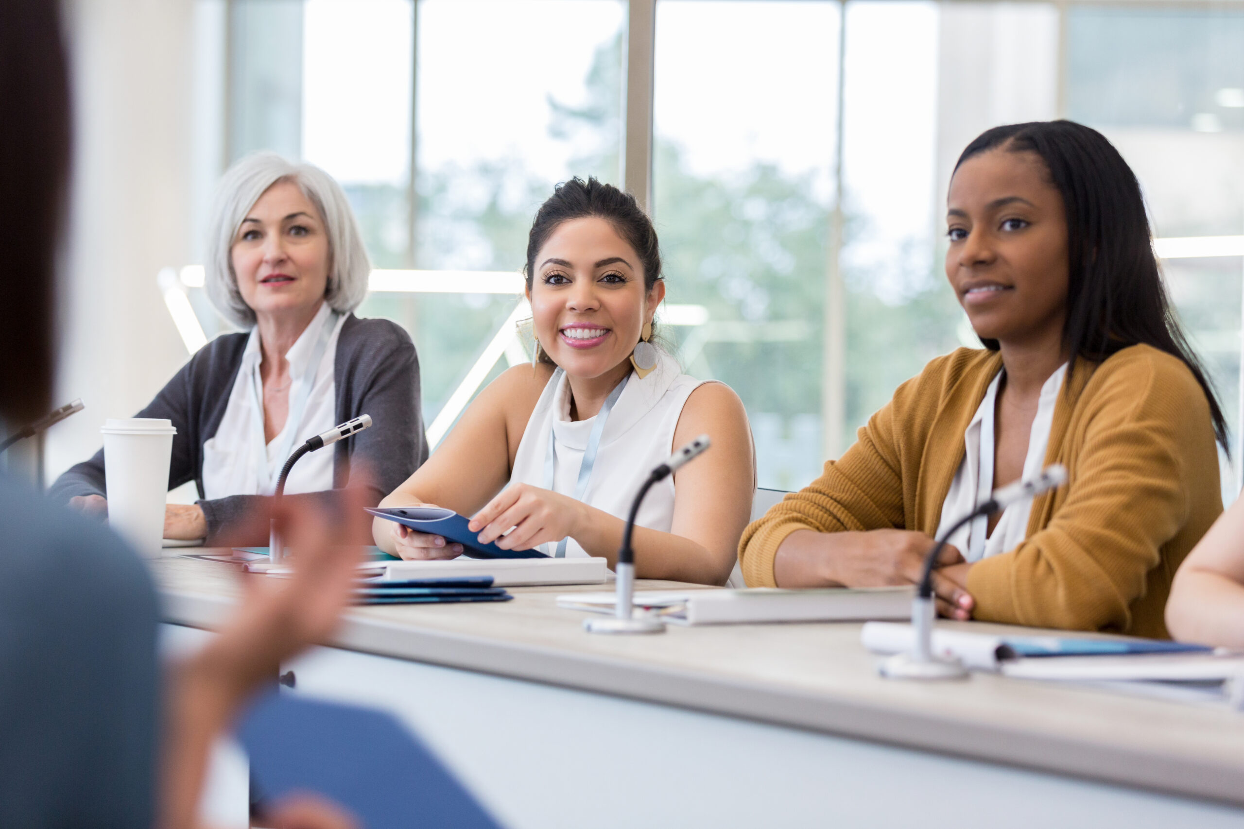 When an unrecognizable person in the audience asks a question, the diverse panel of women is ready to answer.