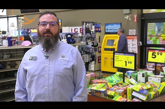 Man standing in front of Renewal Kiosks