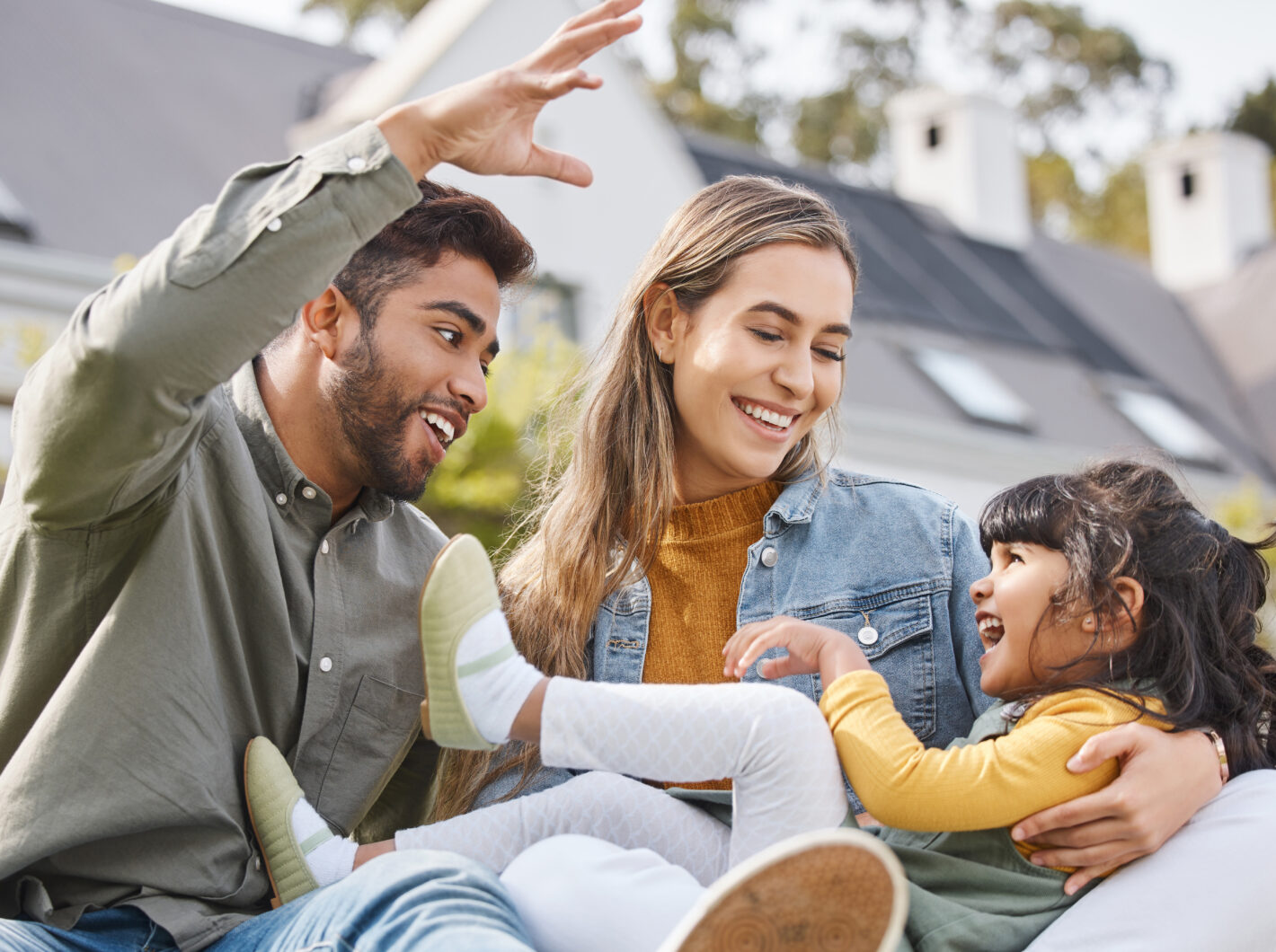 Parents playing with child