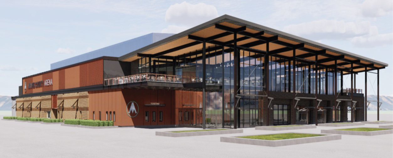 Main entrance of Adams County Arena with glass facade and wooden accents