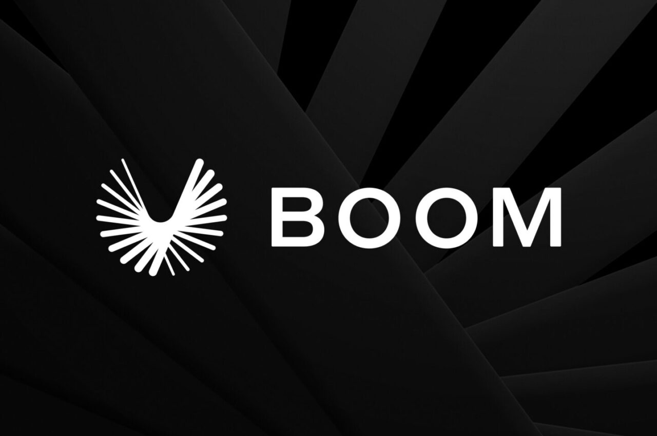 Boom Supersonic logo with dynamic white emblem on black background