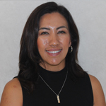 Viridiana Torres smiling, wearing a black sleeveless top and necklace