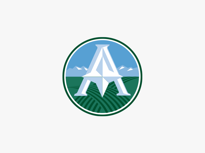 Agricrop logo featuring a stylized white "A" on blue sky and green fields background