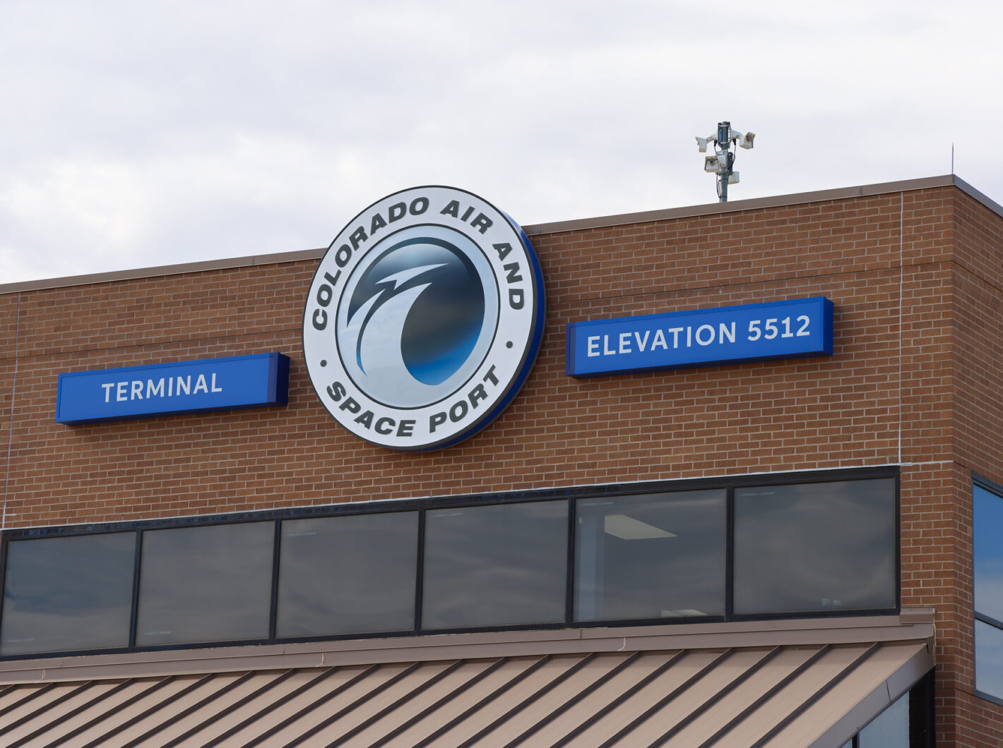 Colorado Air and Space Port terminal sign, elevation 5512