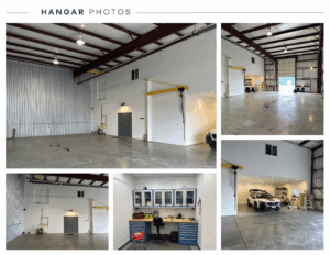 Spacious hangar interior with high ceilings, vehicles, and workshop area.